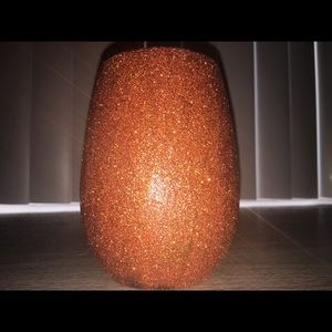 Handmade dark orange wine glass